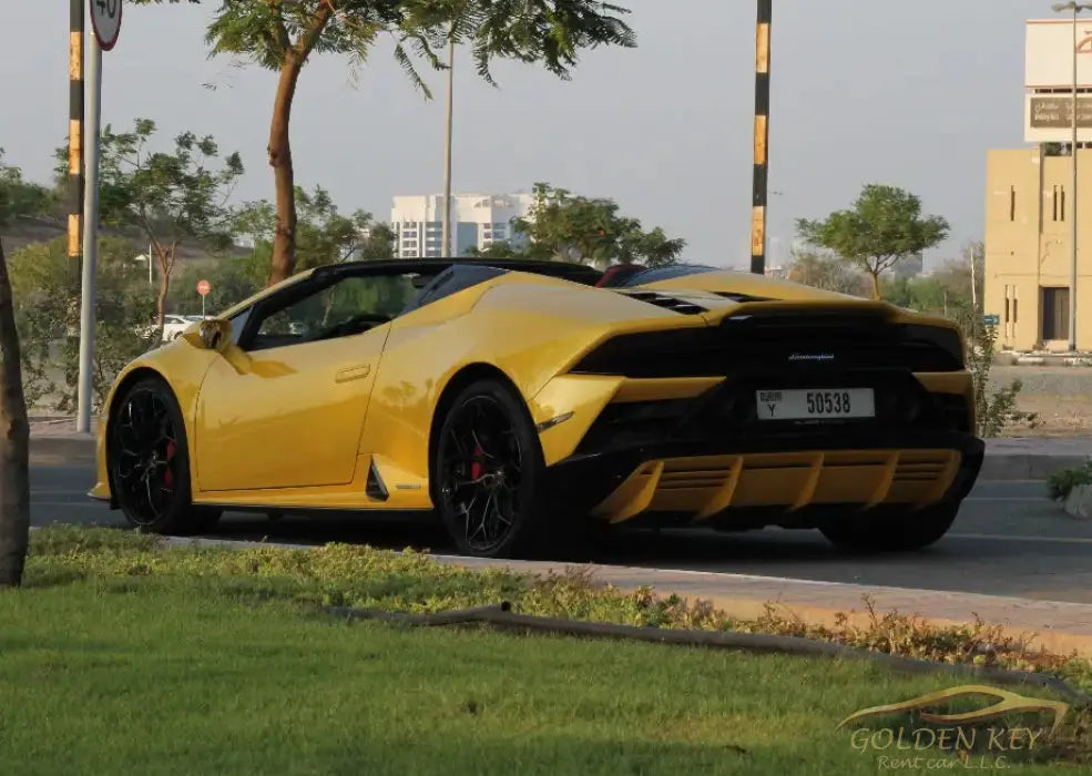Dubai Airport Transfer - With Lamborghini Huracan Evo Spyder 2023 - Golden Key Rent Car LLC