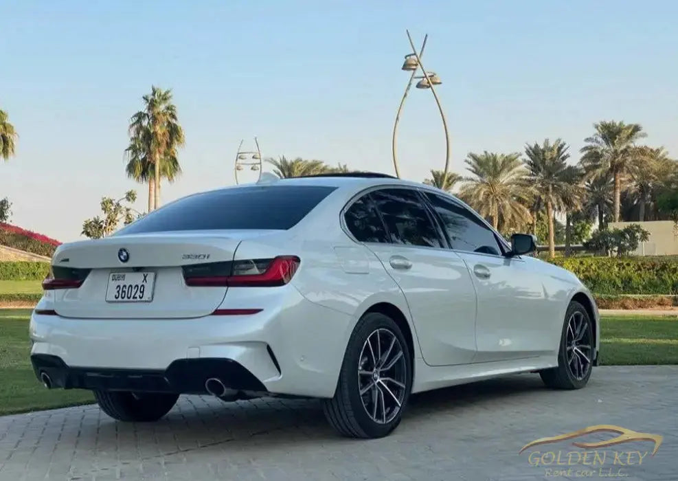 Dubai Airport Transfer - With Bmw 330I 2020 - Golden Key Rent Car LLC