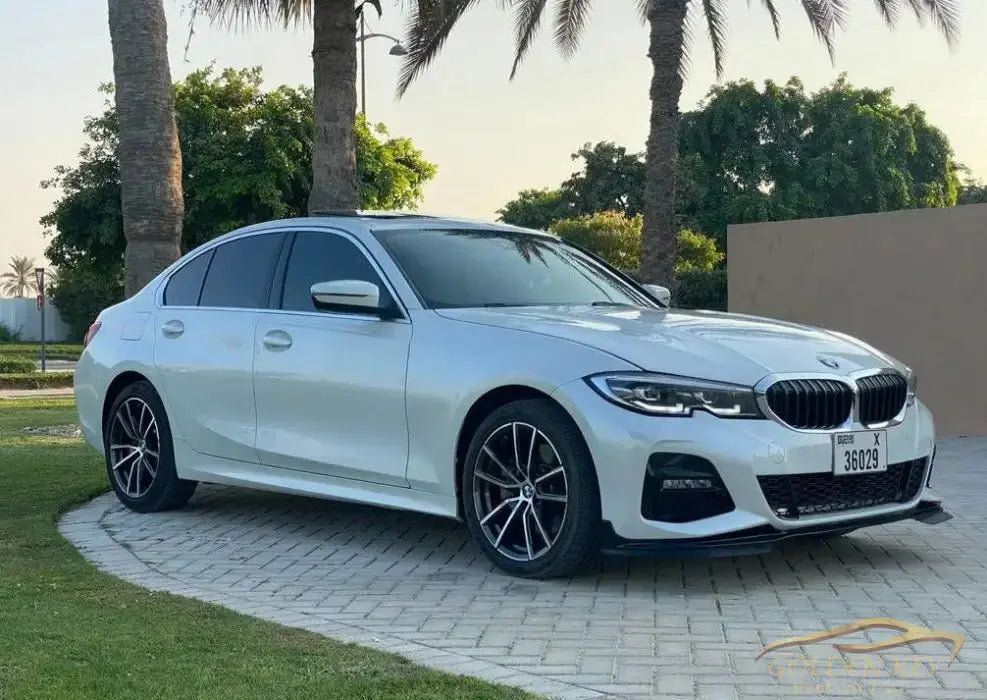 Dubai Airport Transfer - With Bmw 330I 2020 - Golden Key Rent Car LLC