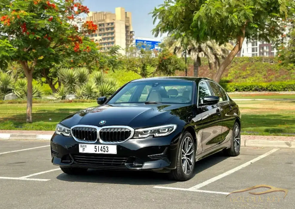 Dubai Airport Transfer - With Bmw 330I 2021 - Golden Key Rent Car LLC