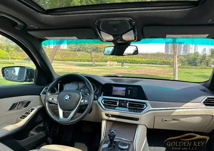 Dubai Airport Transfer - With Bmw 330I 2021 - Golden Key Rent Car LLC