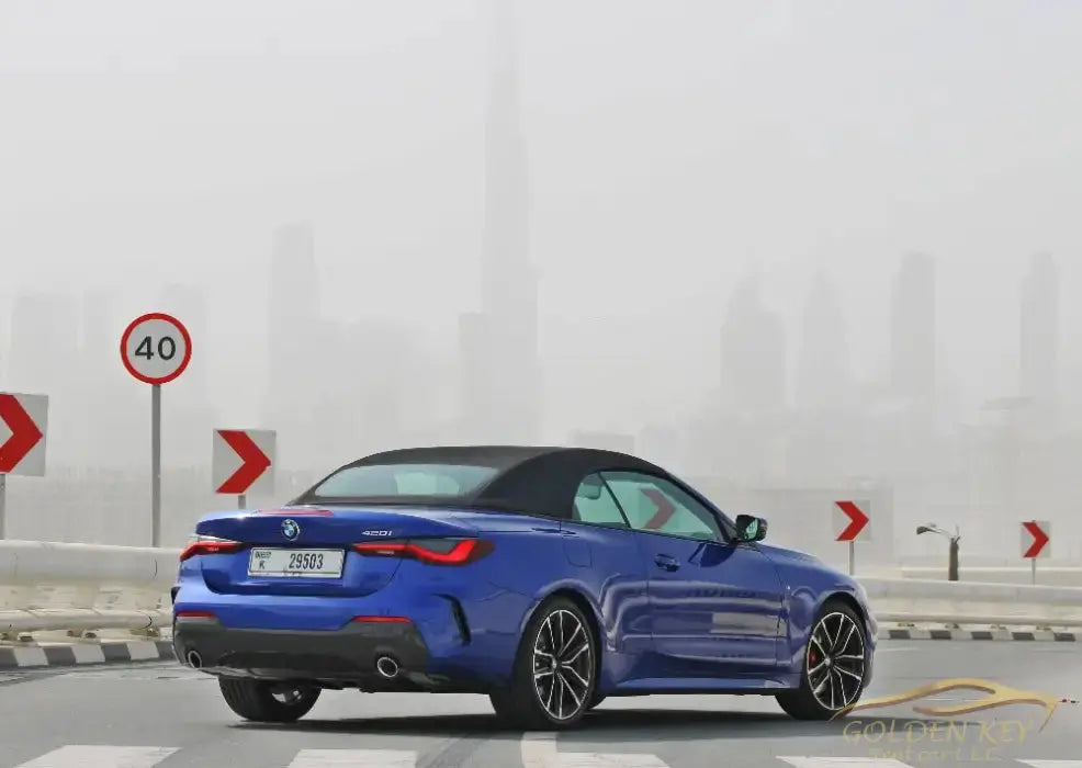 Dubai Airport Transfer - With Bmw 420I 2023 - Golden Key Rent Car LLC