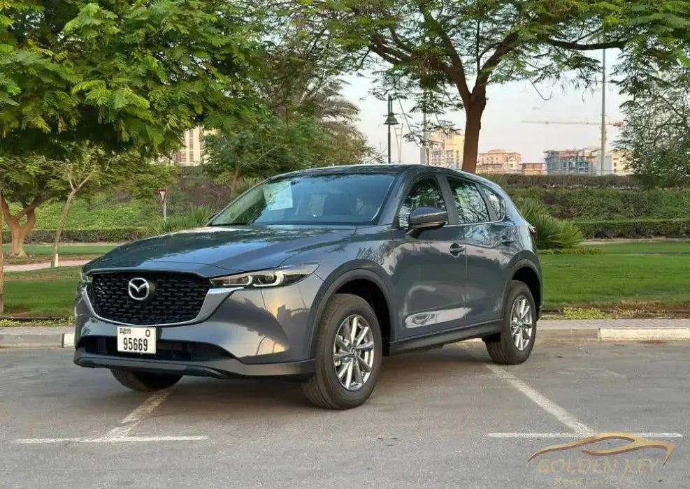 Dubai Airport Transfer - With Mazda CX-5 2024 - Golden Key Rent Car LLC