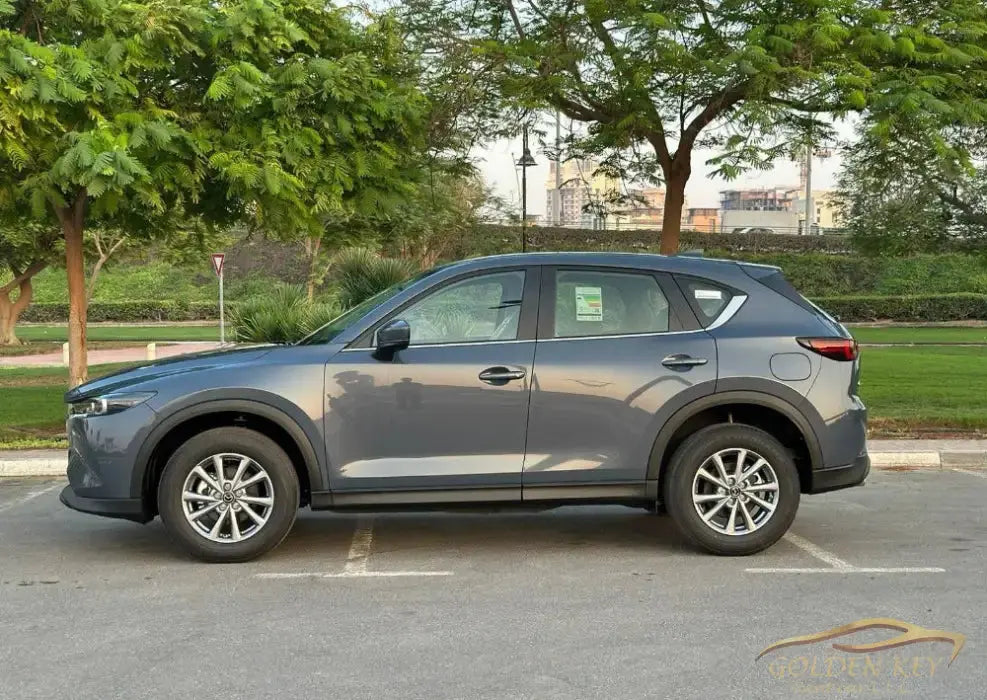 Dubai Airport Transfer - With Mazda CX-5 2024 - Golden Key Rent Car LLC