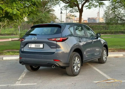 Dubai Airport Transfer - With Mazda CX-5 2024 - Golden Key Rent Car LLC