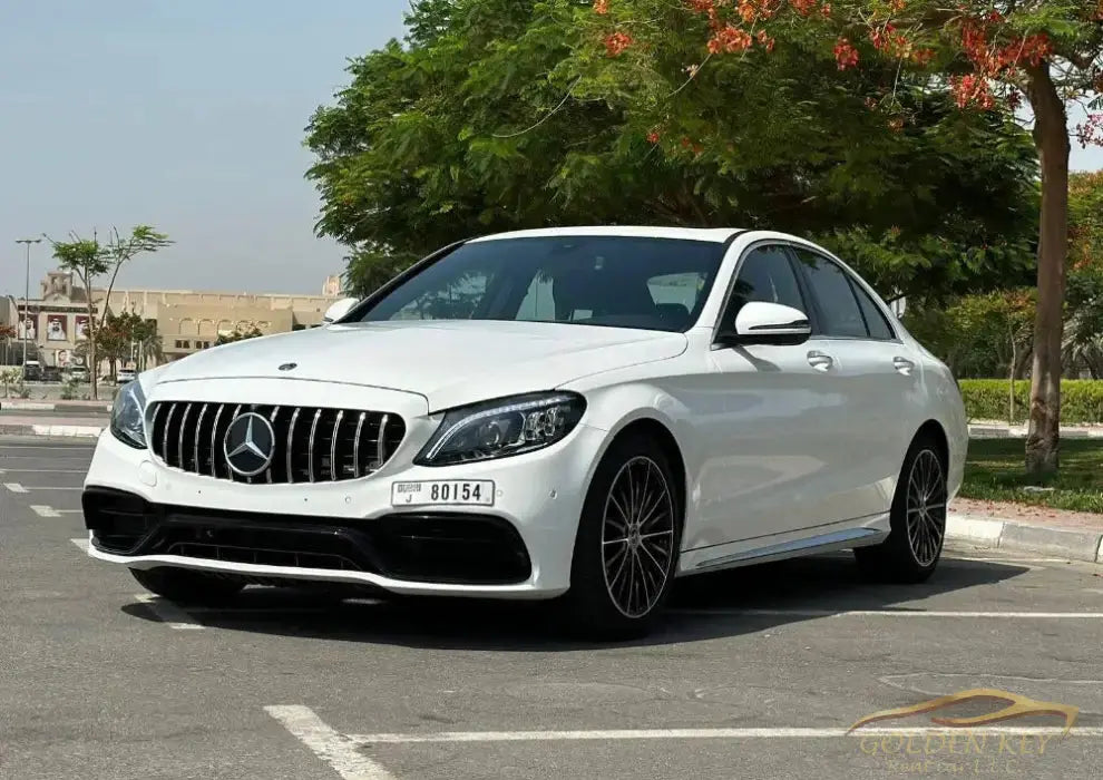 Dubai Airport Transfer - With Mercedes-Benz C300 2021 - Golden Key Rent Car LLC