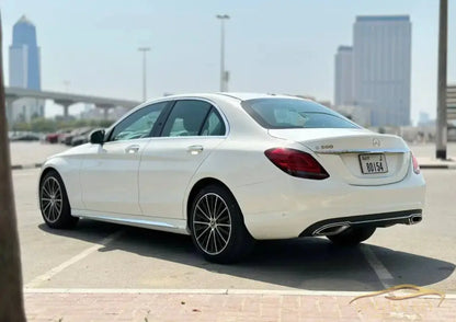 Dubai Airport Transfer - With Mercedes-Benz C300 2021 - Golden Key Rent Car LLC