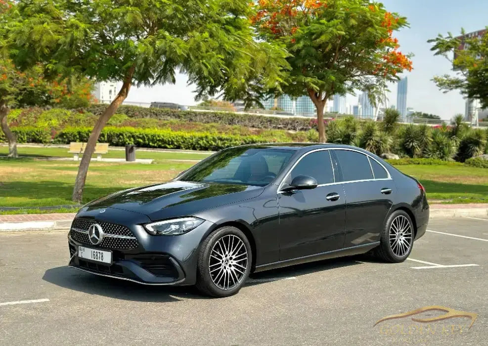 Dubai Airport Transfer - With Mercedes-Benz C300 2022 - Golden Key Rent Car LLC