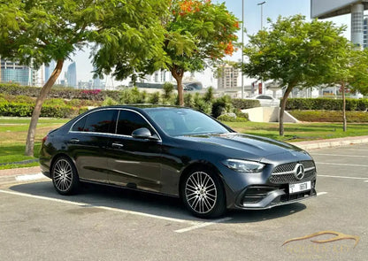 Dubai Airport Transfer - With Mercedes-Benz C300 2022 - Golden Key Rent Car LLC