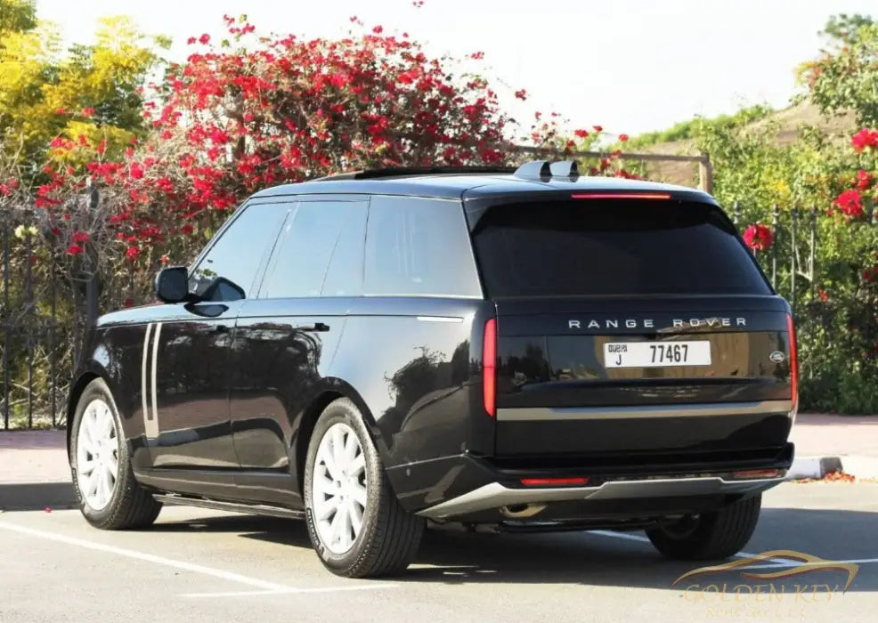 Dubai Airport Transfer - With Range Rover Vogue 2023 - Golden Key Rent Car LLC